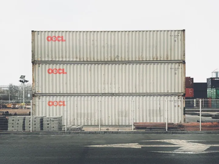 Stacks of shipping containers at a cargo terminal